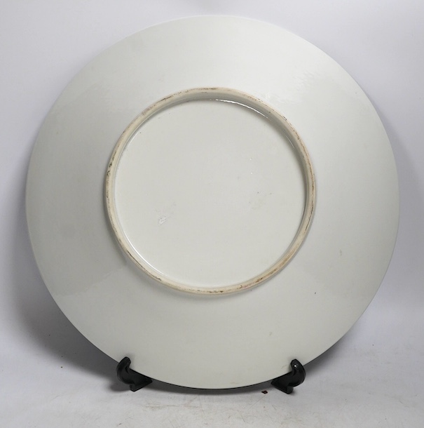 A large Chinese famille rose saucer dish, 35cm diameter. Condition - good